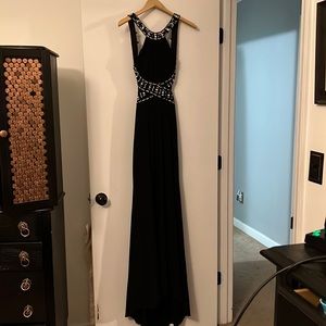 Gorgeous black backless beaded prom dress by Morgan and Co in ladies size 3/4